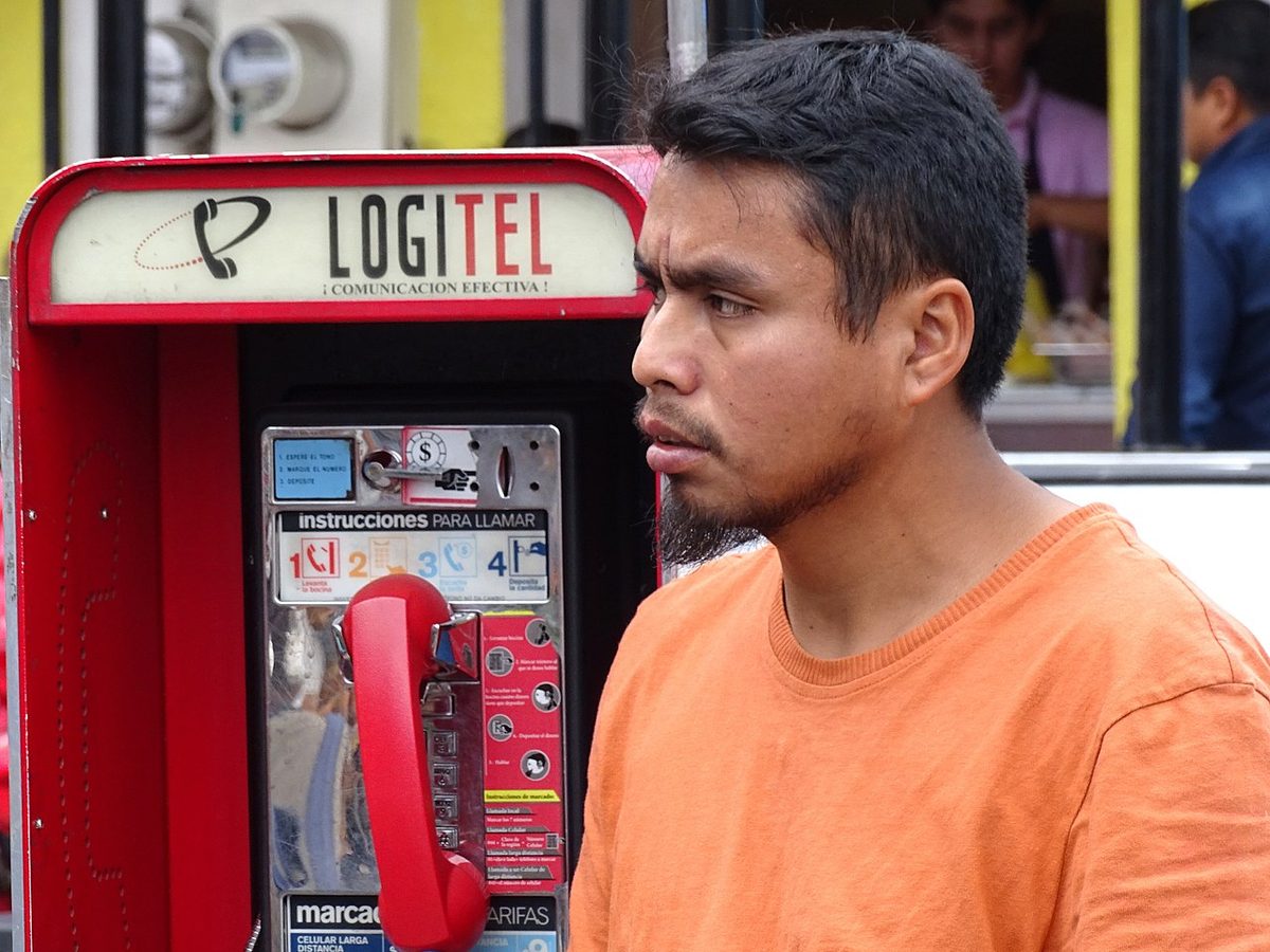 Young Man at Phone Booth - Coatepec - Veracruz - Mexico (15920248177).jpg