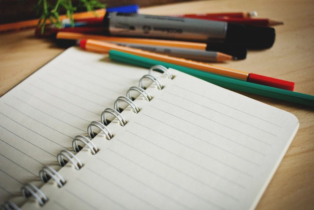 Free open notebook, pens pencils
